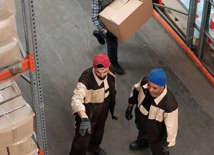 Warehouse team handling stock and packages